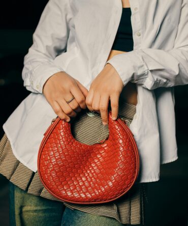 Bolso de mano con bolsillos delanteros
